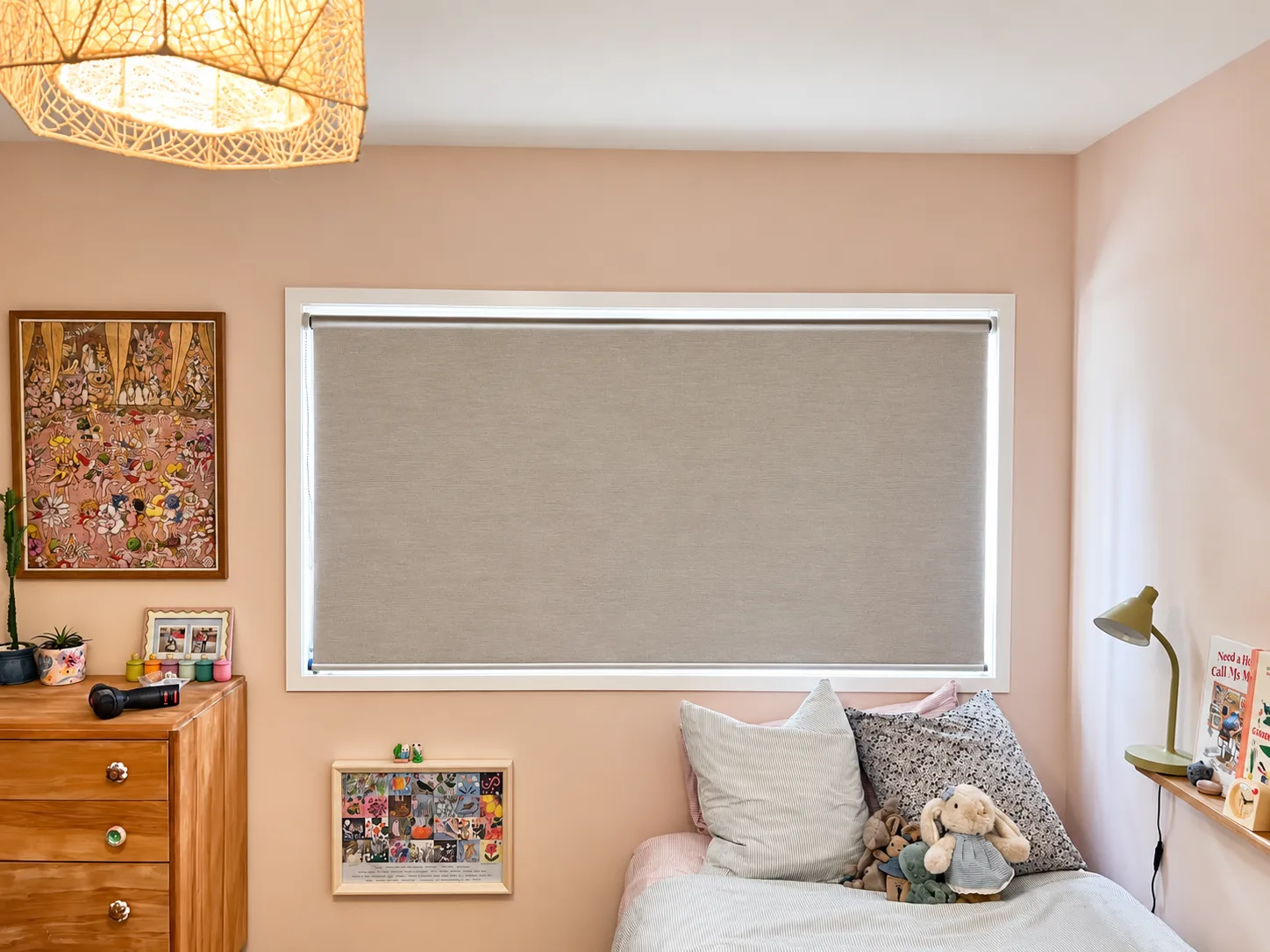 Children’s bedroom with a soft grey roller blind